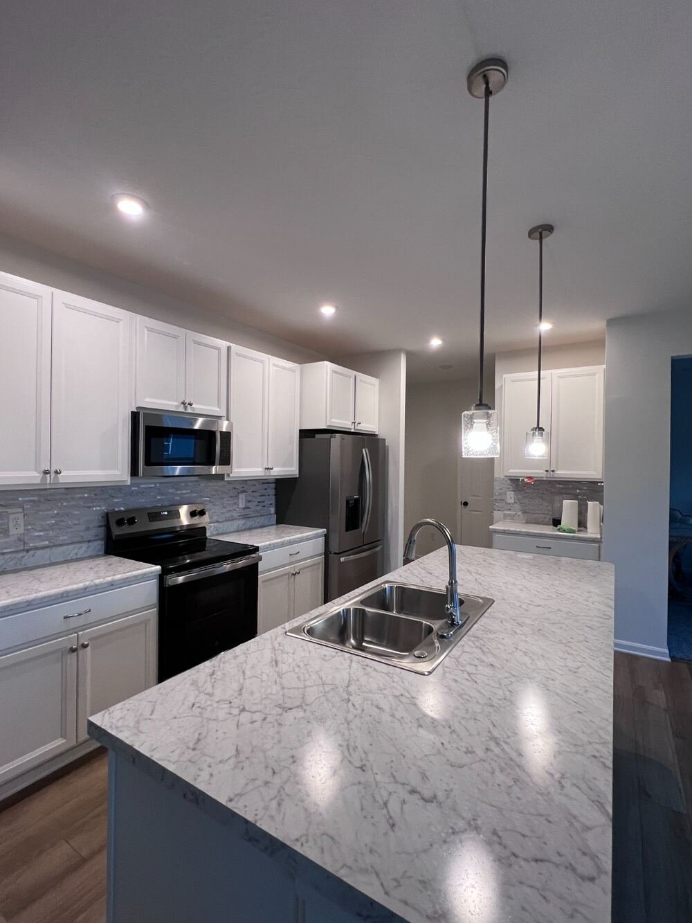 Sparkling marble kitchen countertops after Brightline deep clean