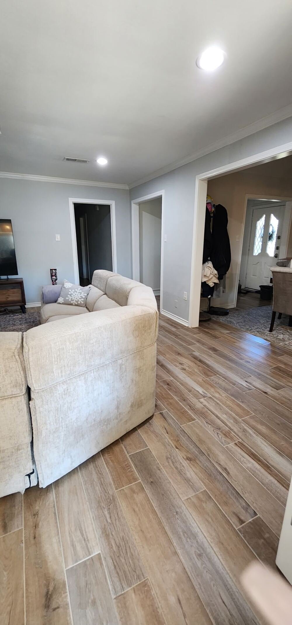 Clean bright living room with wood floors